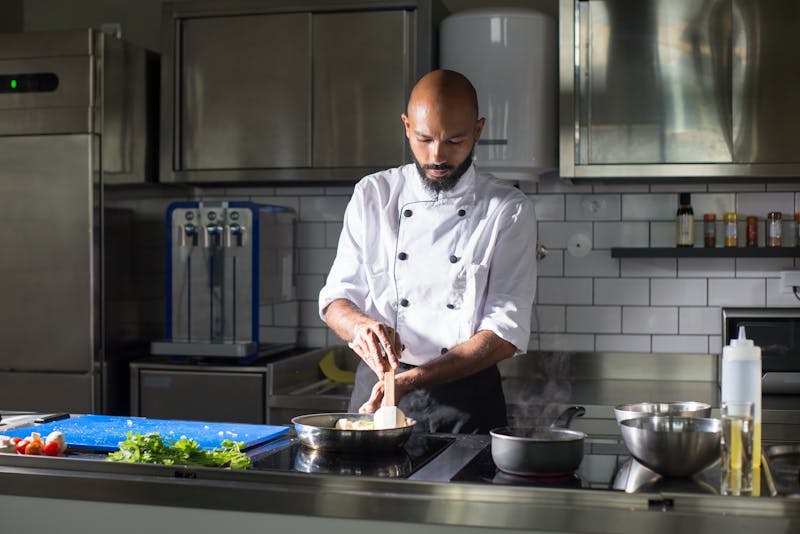 Chef preparing fresh east coast wings with quality ingredients